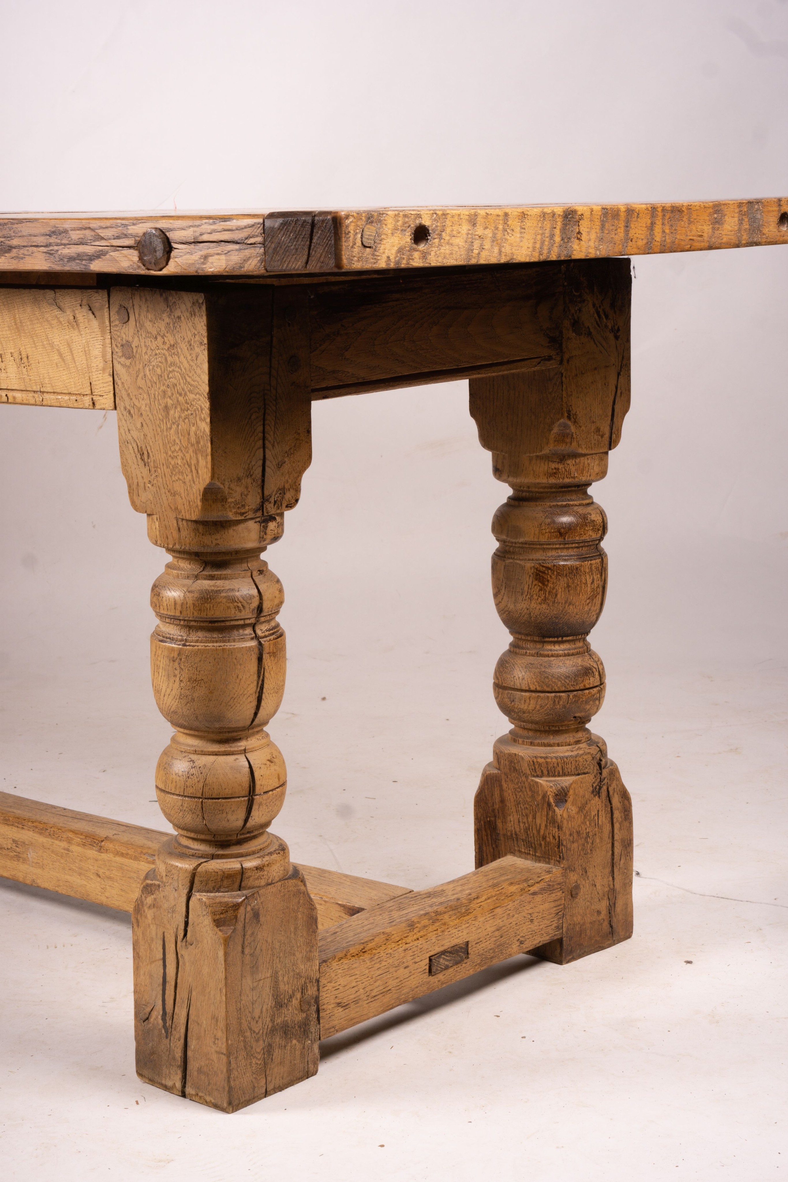 An 18th century style rectangular oak refectory dining table, length 238cm, depth 73cm, height 75cm